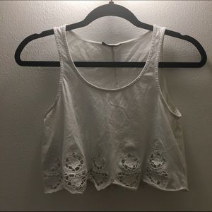 Cropped tank top with cut outs